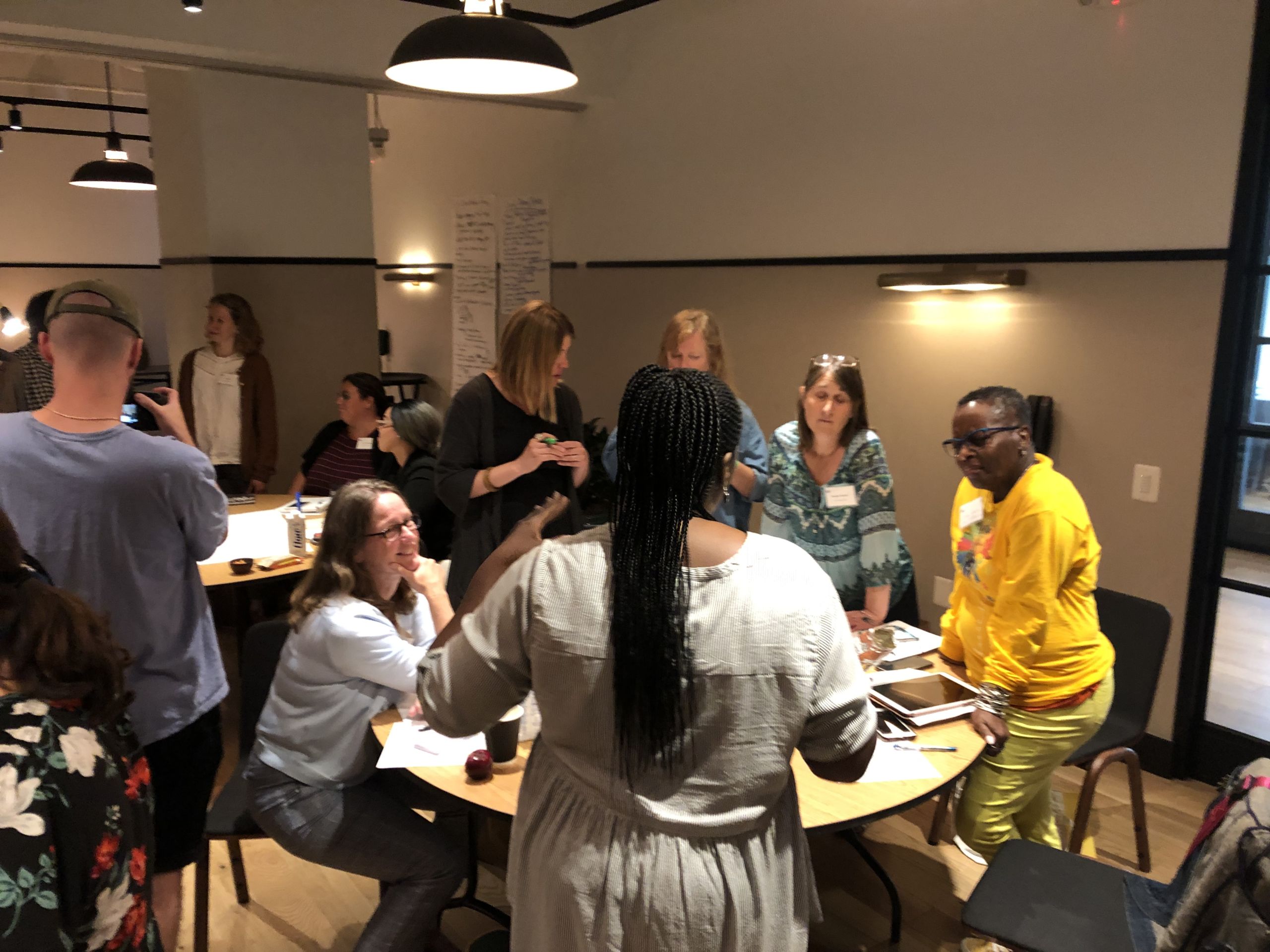 A group of teachers and advocates at a workshop.