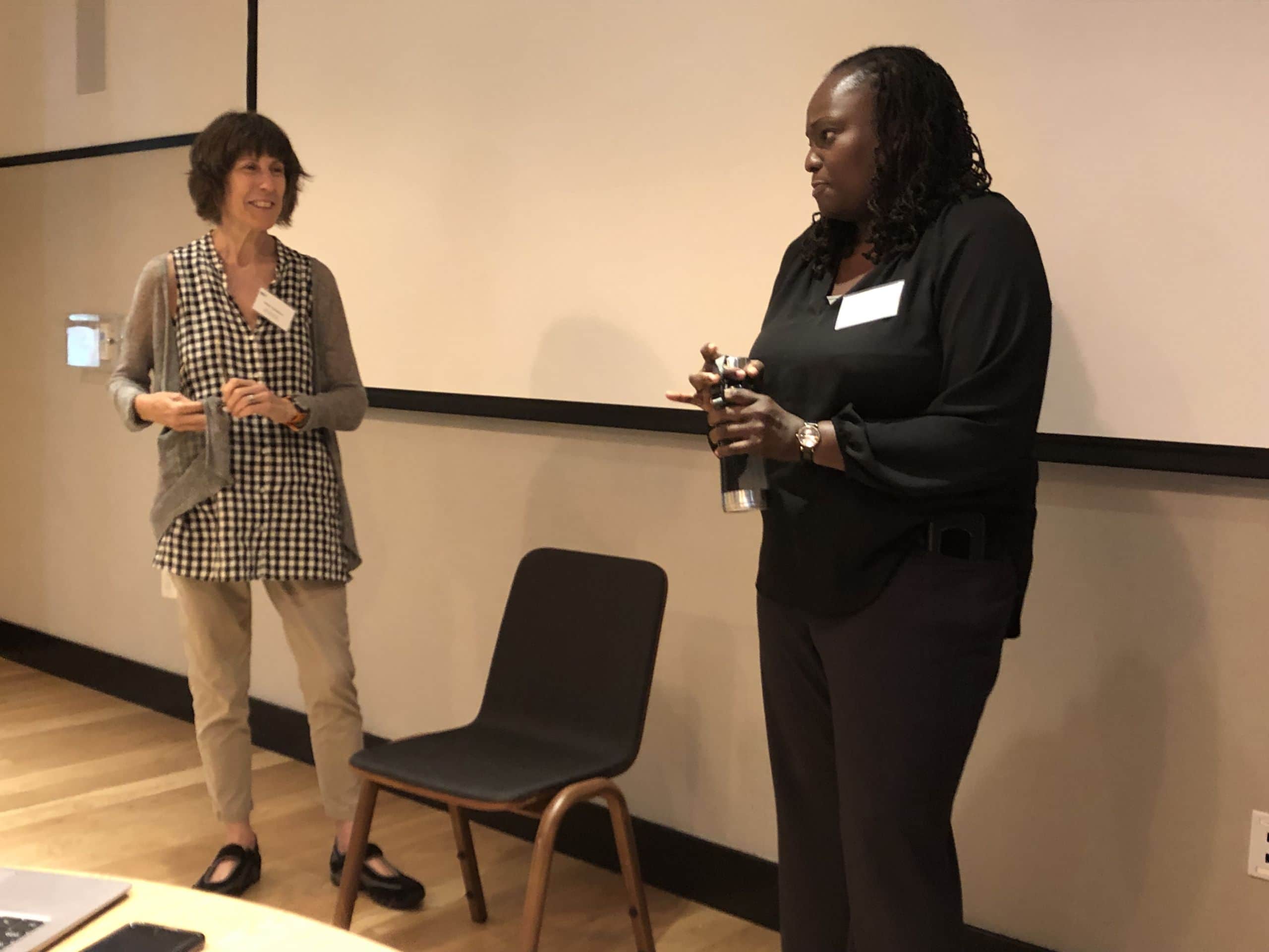 A picture of Susan Ochshorn and Denisha Jones leading a discussion.