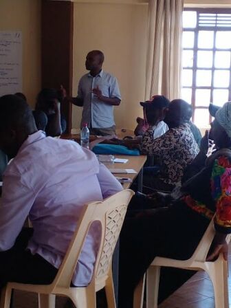 Early Years Educators Session on the theme ‘ Integrating Play-based approach to holistic education’. Adult educators listening to a presenter.