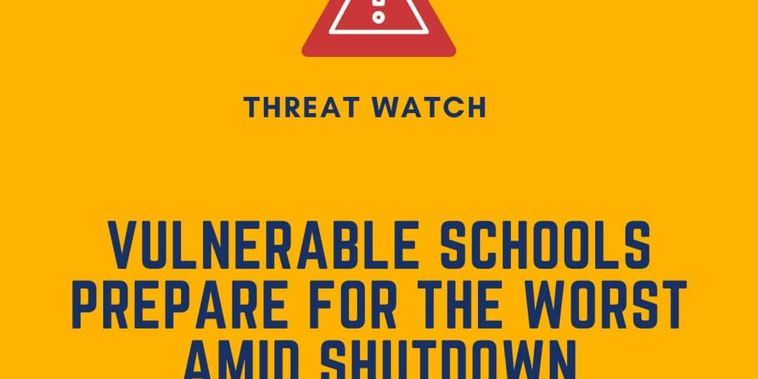 A warning sign above text reading "Vulnerable schools prepare for the worst amid shutdown" with a note to learn more at www.dey.org.